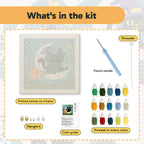 What is in the Moon Swing Cat kit: printed canvas, punch needle, threader, threads, color guide and hangers