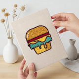 Hand holding a finished Movie Night Snacks mini canvas