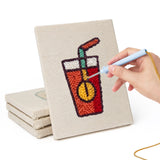 Hand punching one of the Movie Night Snacks mini canvases