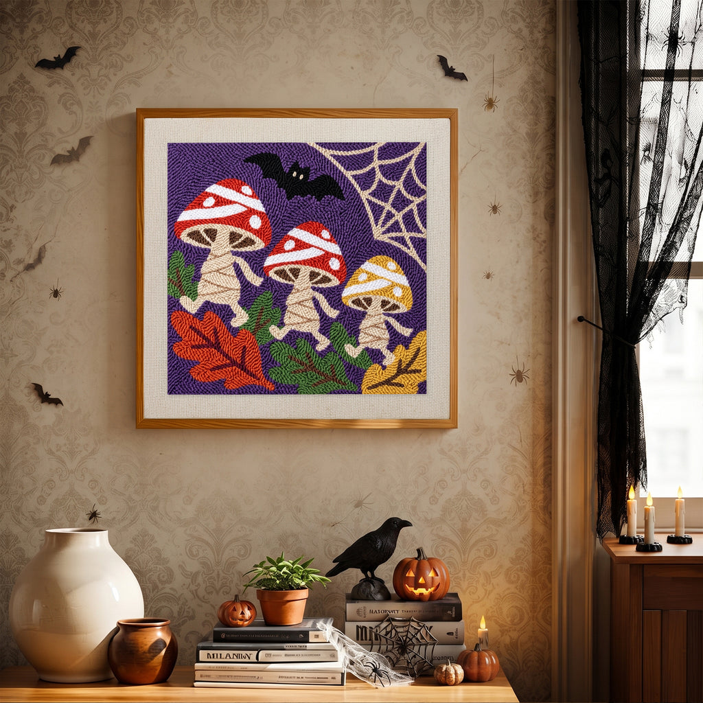 Finished Mummy Mushrooms punch needle canvas on a wall