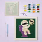 Mummy on the Loo canvas before and after punching, with the threads and tools