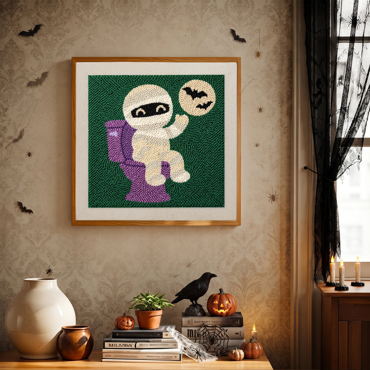 Finished Mummy on the Loo punch needle canvas on a wall