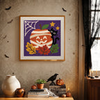 Finished Mummy Pumpkin Cat punch needle canvas on a wall