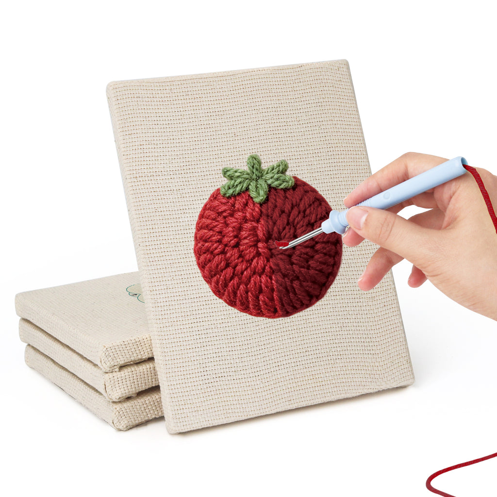 Hand punching one of the Mushroom and Chilies mini canvases