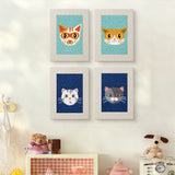 The four Navy Teal Cats mini canvases on a wall above a shelf