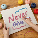 Punching the Never Give Up design with the punch needle