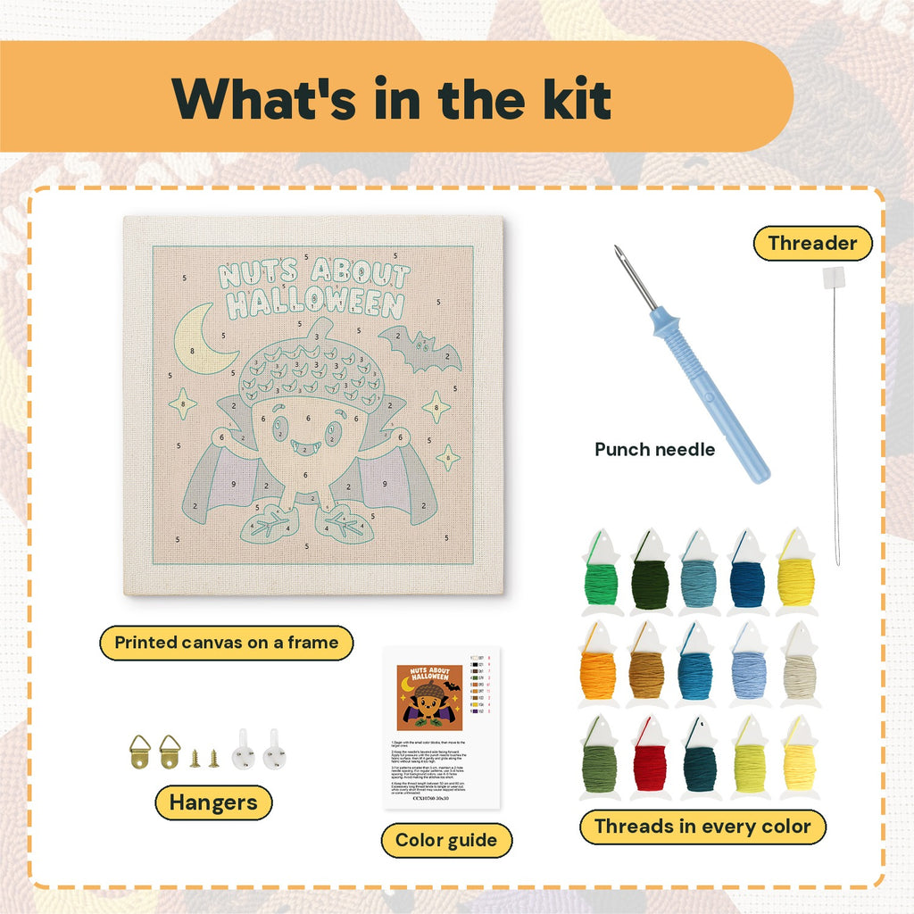 What is in the Nuts About Halloween kit: printed canvas, punch needle, threader, threads, color guide and hangers