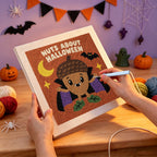 Punching the Nuts About Halloween design with the punch needle