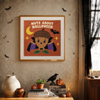 Finished Nuts About Halloween punch needle canvas on a wall