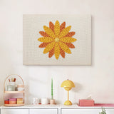 Finished Orange Dahlia punch needle canvas on a wall