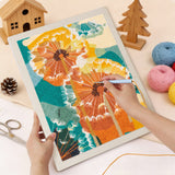 Punching the Orange Dandelions design with the punch needle