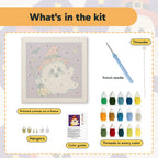 What is in the Orange Hat Ghost kit: printed canvas, punch needle, threader, threads, color guide and hangers