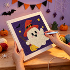 Punching the Orange Hat Ghost design with the punch needle