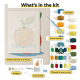 What is in the Orange on Blue kit: printed canvas, punch needle, threader, threads, color guide and hangers