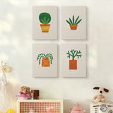 The four Orange Pot Greens mini canvases on a wall above a shelf