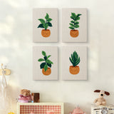 The four Orange Pot Plants mini canvases on a wall above a shelf