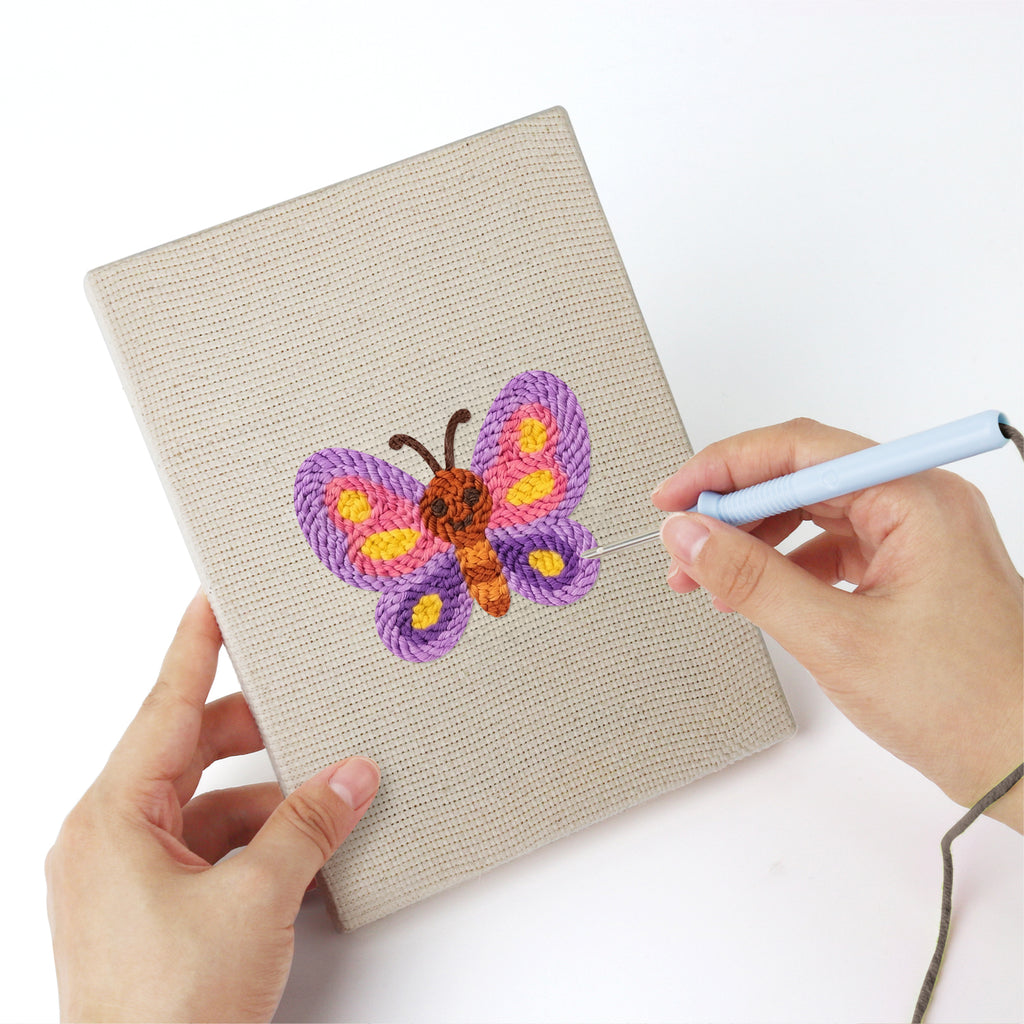 Punching a Owl and Butterfly mini canvas with the punch needle