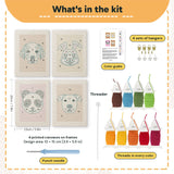 What is in the Panda and Labrador set: 4 printed canvases, punch needle, threader, threads, color guide and 4 sets of hangers (6 × 8 in (15 × 20 cm) each)