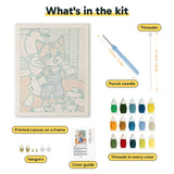 What is in the Paper Roll Mischief kit: printed canvas, punch needle, threader, threads, color guide and hangers
