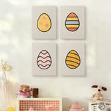 The four Patterned Easter Eggs mini canvases on a wall above a shelf