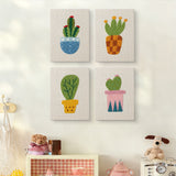 The four Patterned Pot Cacti mini canvases on a wall above a shelf