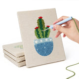 Hand punching one of the Patterned Pot Cacti mini canvases