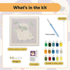 What is in the Peace Sign Ghost kit: printed canvas, punch needle, threader, threads, color guide and hangers