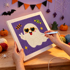 Punching the Peace Sign Ghost design with the punch needle