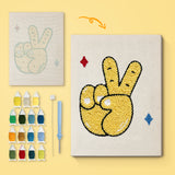 Peace Sign Hand canvas before and after punching, with the threads and tools