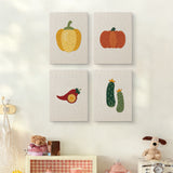 The four Peppers and Zucchini mini canvases on a wall above a shelf