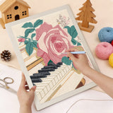 Punching the Piano Rose design with the punch needle