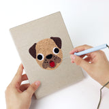 Punching a Pig and Camel mini canvas with the punch needle