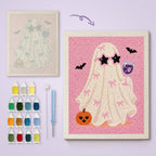 Pink Bow Ghost canvas before and after punching, with the threads and tools