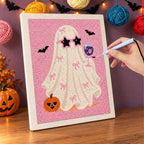 Punching the Pink Bow Ghost design with the punch needle