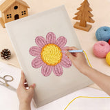 Punching the Pink Daisy Head design with the punch needle