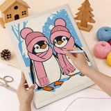 Punching the Pink Hat Penguins design with the punch needle