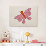 Finished Pink Moth punch needle canvas on a wall