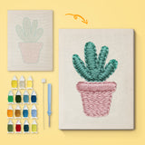 Pink Pot Succulent canvas before and after punching, with the threads and tools