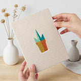 Hand holding a finished Pink Stem Cacti mini canvas