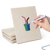 Hand punching one of the Pink Stem Cacti mini canvases