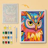 Pop Color Owl canvas before and after punching, with the threads and tools