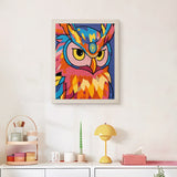 Finished Pop Color Owl punch needle canvas on a wall