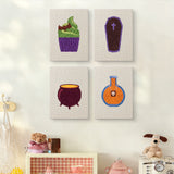 The four Potion and Cupcake mini canvases on a wall above a shelf