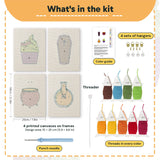 What is in the Potion and Cupcake set, 8 × 12 in (20 × 30 cm) each: 4 printed canvases, punch needle, threader, threads, color guide and 4 sets of hangers