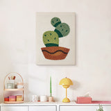 Finished Prickly Pear Bowl punch needle canvas on a wall