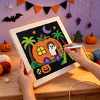 Punching the Pumpkin Camper Ghost design with the punch needle