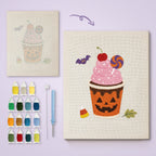 Pumpkin Cup Sundae canvas before and after punching, with the threads and tools