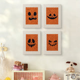 The four Pumpkin Grins mini canvases on a wall above a shelf