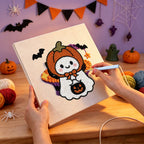 Punching the Pumpkin Hat Ghost design with the punch needle