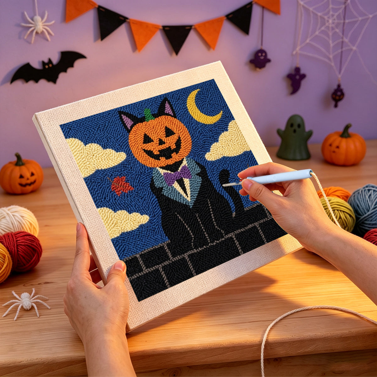 Punching the Pumpkin Head Cat design with the punch needle